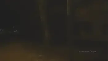 Naked woman walking on the city street in the early morning. Public.