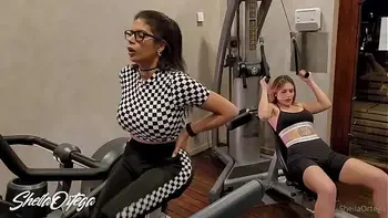Lesbians get hot in the gym and go to the bathroom to fuck