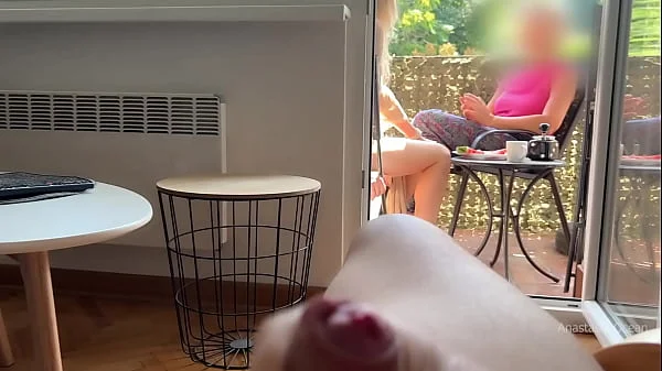 My husband is jerking off and cum in front of my stepmom a while we talk on balcony.