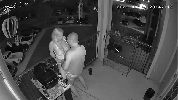 Couple caught on the balcony