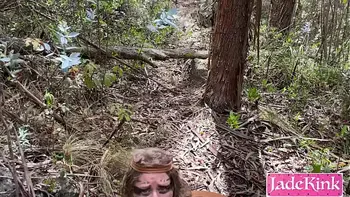 Forest girl tied to tree