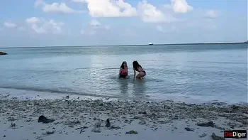 Busty stepmom and stepdaughter got golden showers instead of tanning on a public beach