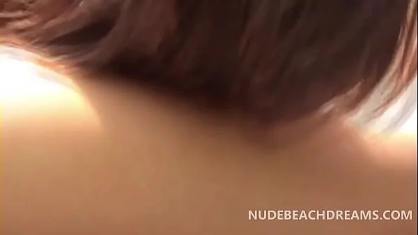 Lesbian girlfriends sharing a dick right on the beach