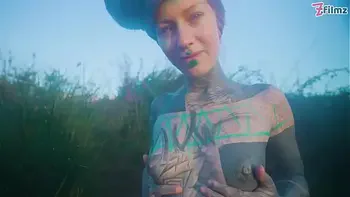 Alternative couple having wild outdoor sex in outdoor hotbath