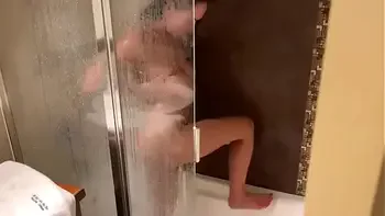 Pervert stepbro spying into sister's shower to shoot a huge sperm load on her face??