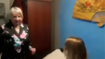 A busty granny invites a curvy next-door girl for a nice, lesbian evening