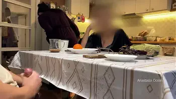 My husband jerking under a table front of my step mom and i right at the kitchen.