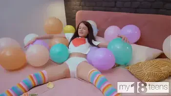MY18TEENS - Skinny girl with small tits blows up balloons and fucks herself with a dildo