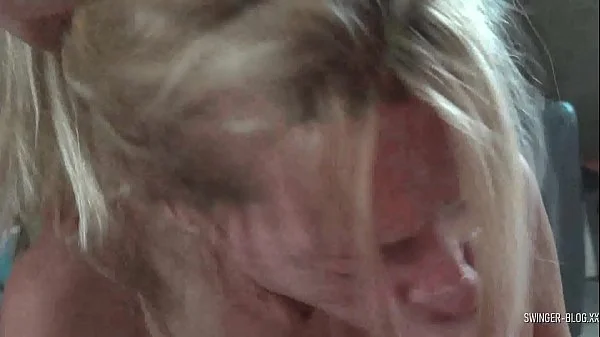 Blonde amateur swinger MILF giving a sloppy blowjob