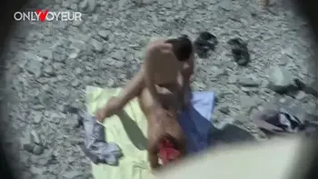 Beach Voyeur. Curvy MILF gives head and get it from behind in public