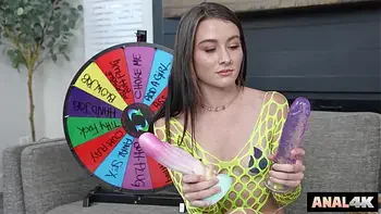 Anal Slut Uses The Wheel Of Anal To See What Will Stretch Her Butthole