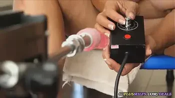 thai grandma plays with a sex machine