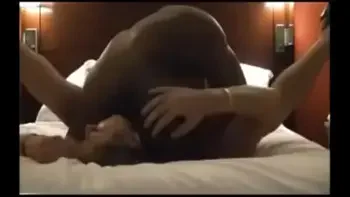 Wife talks to husband while being fucked by black guy