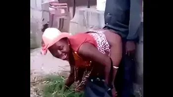 African woman fucks her man in public