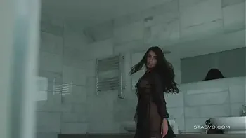 Busty russian babe Megan teasing from the bathtub