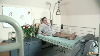 Teen nurses fuck old grandpa in a fake hospital bed and give sloppy blowjob
