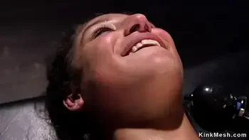 Tied up and hanged brunette toyed