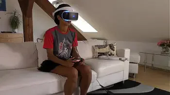 Isabel flashes her pussy and ass under her panties with a tshirt and she has a new game in her Playstation VR but she needs..