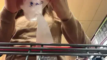 Squirting On A CuCUMber In A Parking Lot