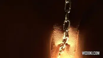 Busty Goth babe with pierced nipples and chain pussy playing