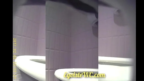 The camera in the women's toilet filmed the beautiful vaginas of girls close-up