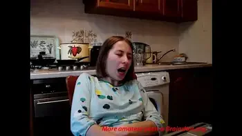 Teenie fingers to orgasm in kitchen