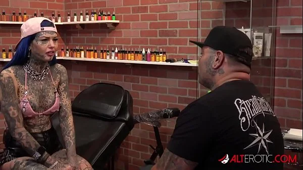 Behind the scenes for Amber Luke's new face tattoo