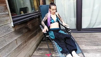 Tattooed French amateur Irogenia strips naked on terrace and fingers her tight pussy and asshole