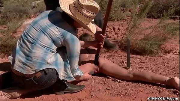 Bound hitchhiker anal toyed in desert