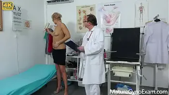 Hot blonde Nicole Star fisted till she cums by her gynecologist