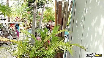 Busty Ebony Mystique Caresses Her Enhanced Tits By The Pool While Her Stepson Is Watching