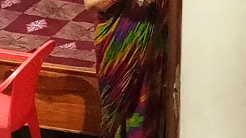 Aunty caught red handed on camera while changing dress.