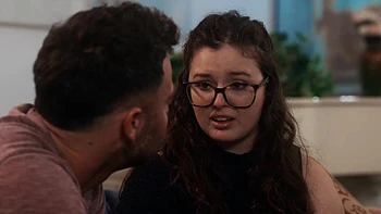 Two cute girls are having fun with two guys in a foursome