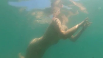 Lovita Fate, sexy angel in bikini by the pool