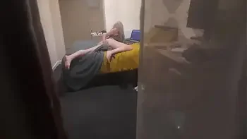 Girl caught masturbating through the window