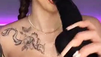 The long-haired gal in a cat costume provides a fellatio with a enormous