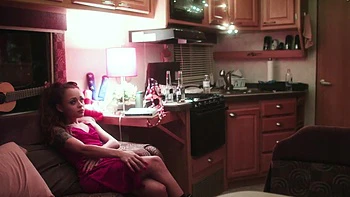 Two lesbians, Holly Hendrix and Evelyn Claire, have fun with each other.