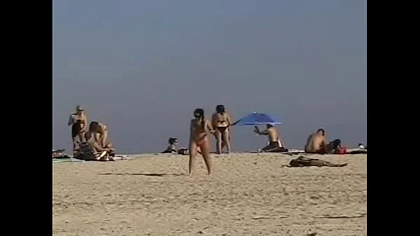 Exhibitionist Wife 19 - Anjelica teasing random voyeurs at a public beach by flashing her shaved cunt!