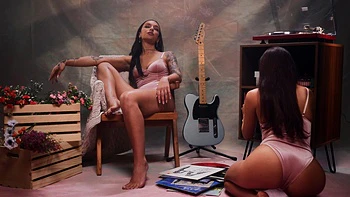 Sexy girls Vanna Bardot and April Olsen have a fun lesbian sex with a strapon.