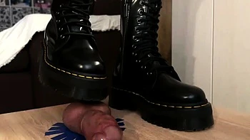 Dr Martens boots smashing slave balls on the Cockbox by