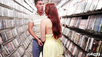Redhead model Audrey Reid opens her wet hole in the book store