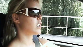 Good outdoor posing session on the beach with a busty Sophie Moone