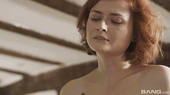 Spicy redhead babe Nina Sever knows how to give an interracial head