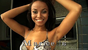 Awesome long-legged brunette Maricella demonstrates her shaved pussy