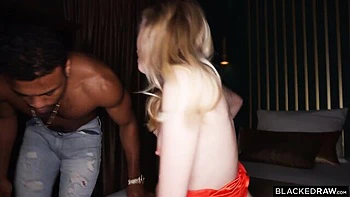 Bella Spark likes her first interracial dick-riding action in the bed