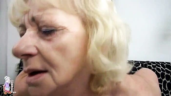 Mature blonde EvaN is touching her hairy pussy with pleasure