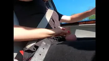 While driving my neighbor La Gourmande wanks my cock for a long time before sucking me while I drive! when I finally stop she greedily swallows all my cum without losing a drop