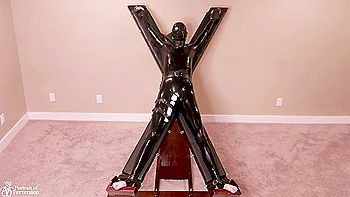 Latex Servitude Floozy Is Made To Have Multiple Orgasms On A Cross