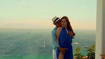 A couple enjoys passionate sex with a stunning redhead, showcasing Jia Lissa’s fiery charm.