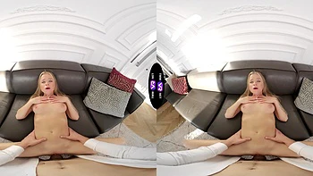 A blonde girl peaches has sex with a guy in the room